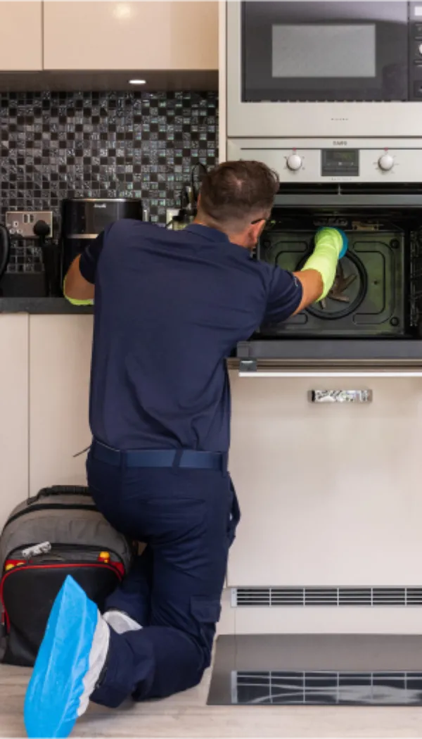 Pacifica engineer performing cooker repair