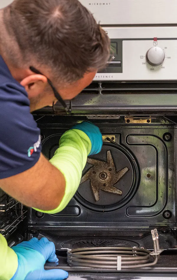 Pacifica engineer fixing oven fan